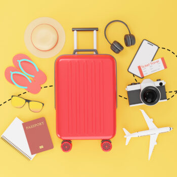 Red suitcase in center with travel accessories and the concept of tourism.3d rendering.